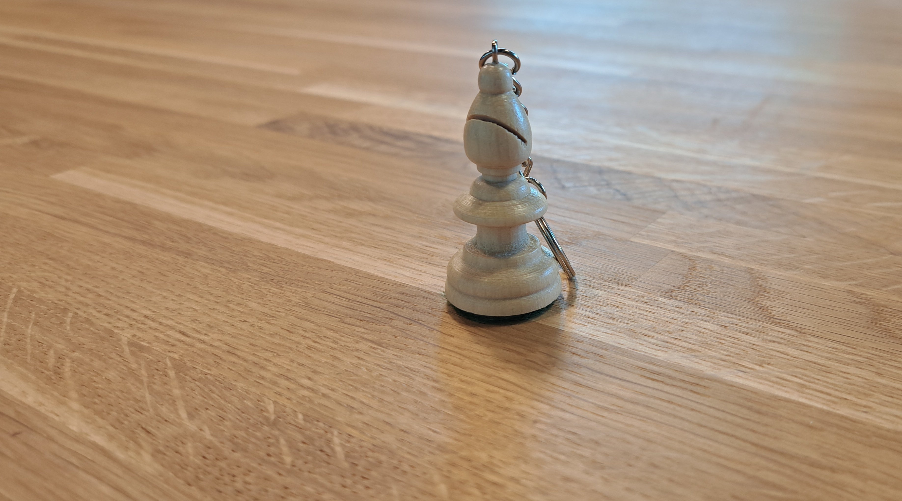 Llavero perseguidor blanco - a1a29269c9db6f49c29f39954d38f5d1